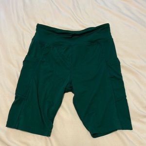 Army green biker shorts with side pockets